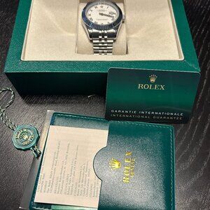 Rolex Oyster Perpetual Datejust – White Dial, Roman Numerals